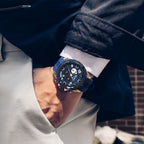 MEGIR 2200 men's chronograph watch on the wrist, rose-gold and blue case with blue dial and blue silicone strap