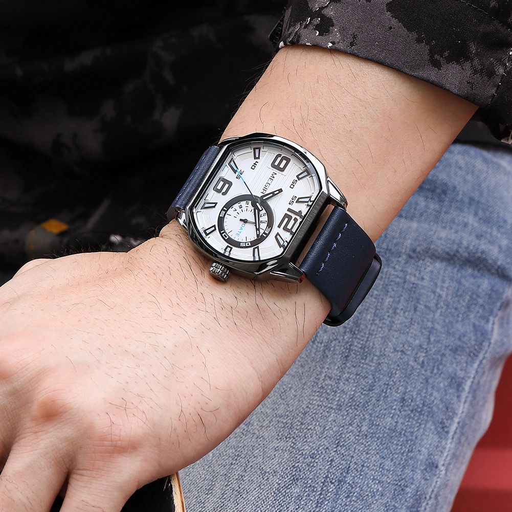 MEGIR 2201 men's sport watch on the wrist, gunmetal case with white dial and blue leather strap