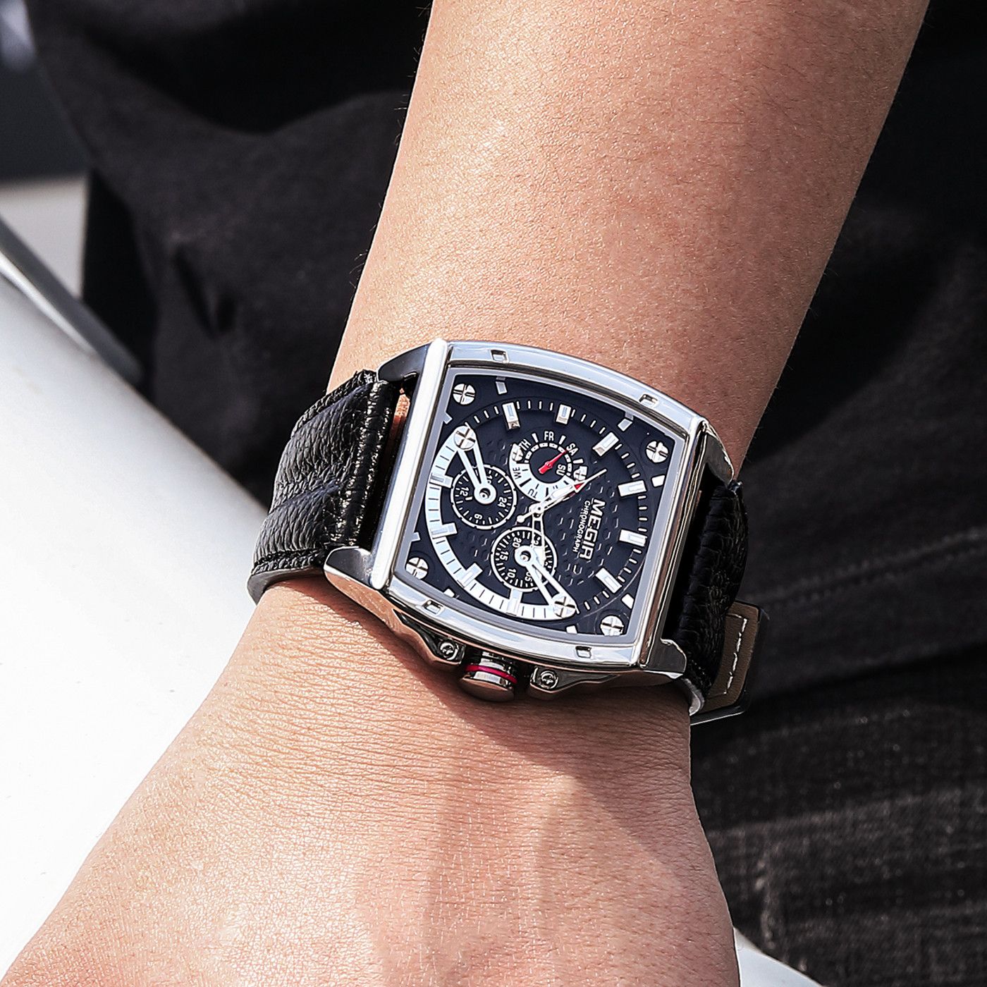 MEGIR 2204 men's chronograph watch on the wrist, silver case with black dial and black leather strap