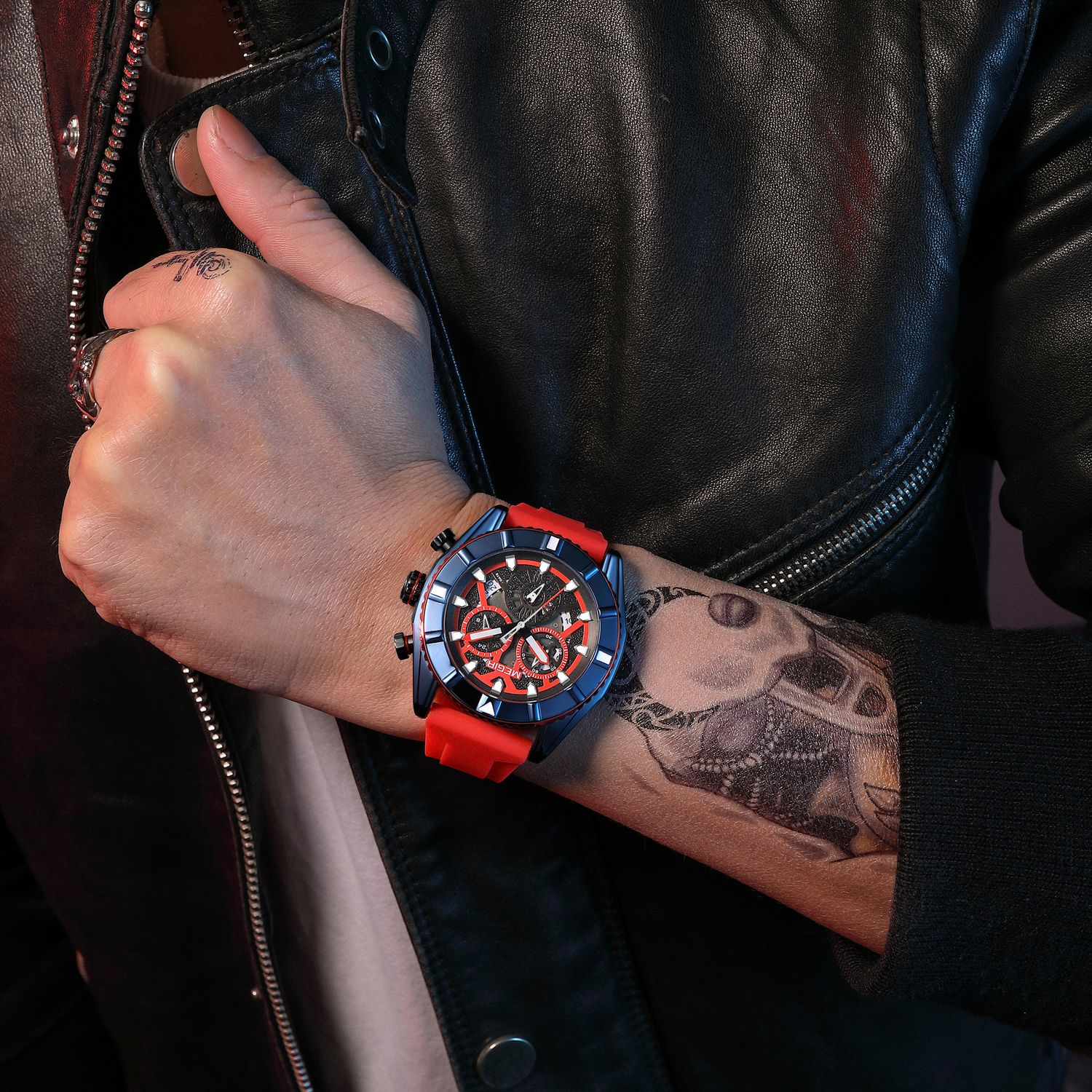 MEGIR 2209 men's chronograph watch on the wrist, blue case with red skeleton dial and red silicone strap