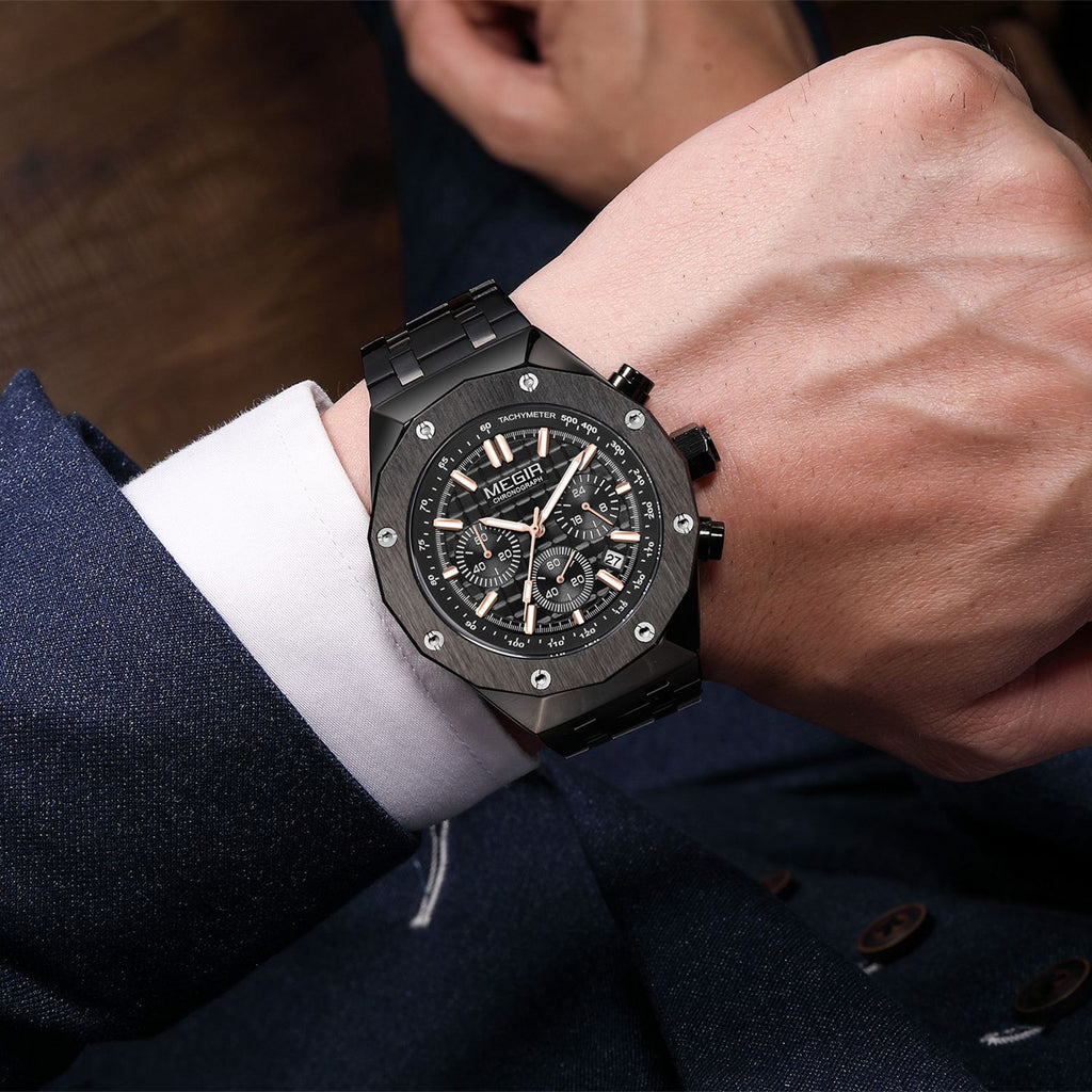 MEGIR 2213 men's chronograph watch on the wrist, black case with rose-gold accents, black dial and steel bracelet