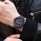 MEGIR 2216 men's chronograph watch on the wrist, black case with blue dial and black bracelet