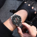 MEGIR 2216 men's chronograph watch on the wrist, silver case with black dial and steel bracelet