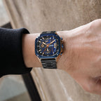 MEGIR 2217 men's chronograph watch on the wrist, blue bezel with rose-gold accents, blue dial and black bracelet