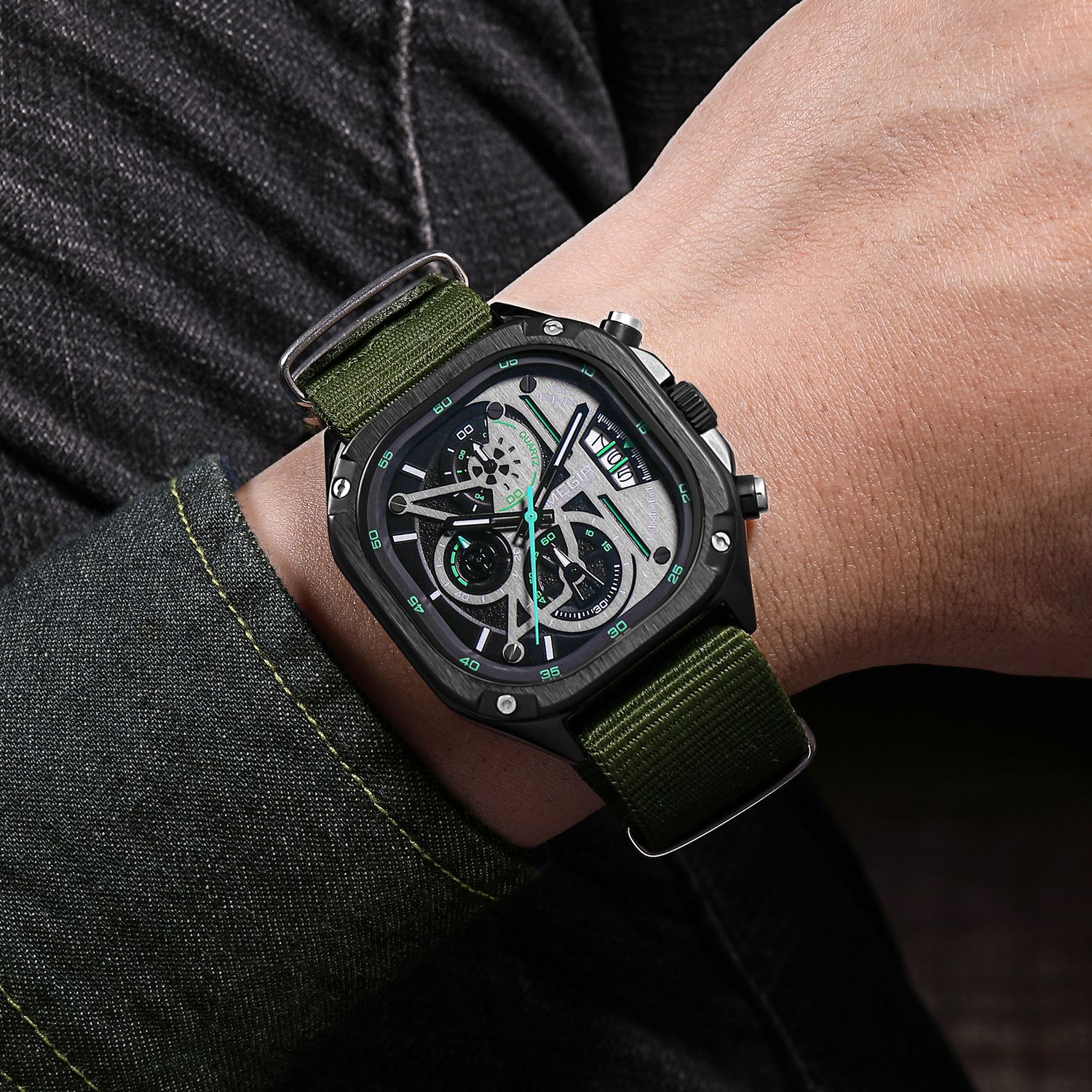 MEGIR 2217 men's chronograph watch on the wrist, black case with green-accent dial and green canvas strap