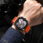 MEGIR 2217 men's chronograph watch on the wrist, black case with white-black dial and orange canvas strap