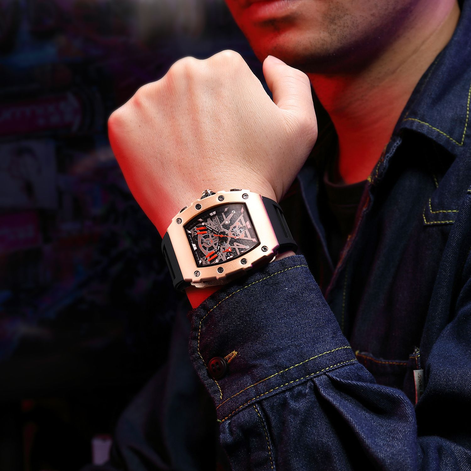 MEGIR 2218 men's skeleton watch on the wrist, rose-gold case with skeleton dial and black silicone strap