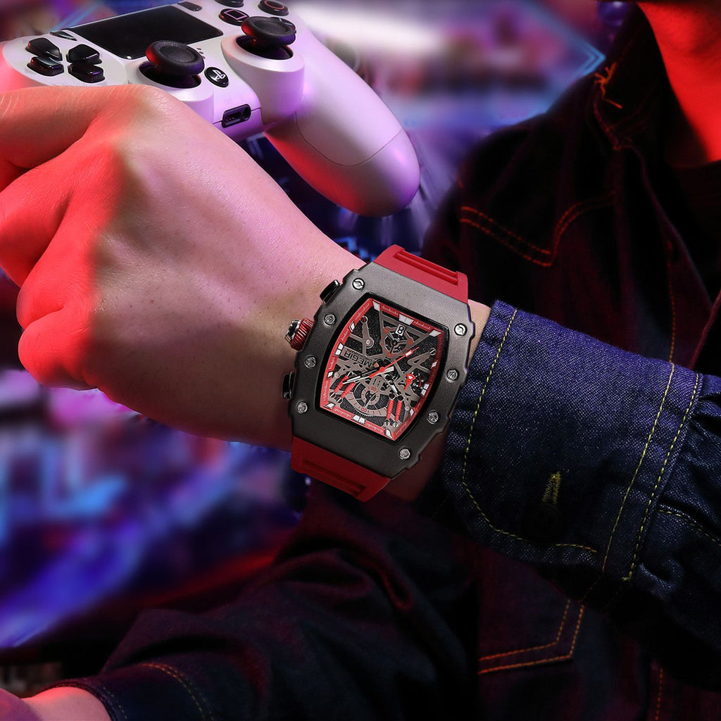 MEGIR 2218 men's skeleton watch on the wrist, black case with red-accent skeleton dial and red silicone strap