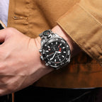 MEGIR 2219 men's chronograph watch on the wrist, silver case with black dial and steel bracelet
