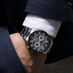 MEGIR 2220 men's chronograph watch on the wrist, silver case with black dial and steel bracelet