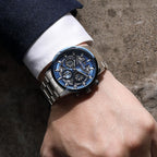 MEGIR 2220 men's chronograph watch on the wrist, silver case with blue bezel, blue dial and steel bracelet