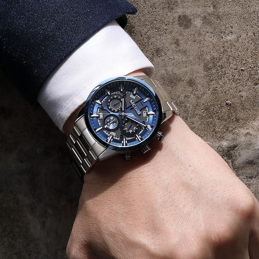 MEGIR 2220 men's chronograph watch on the wrist, silver case with blue bezel, blue dial and steel bracelet