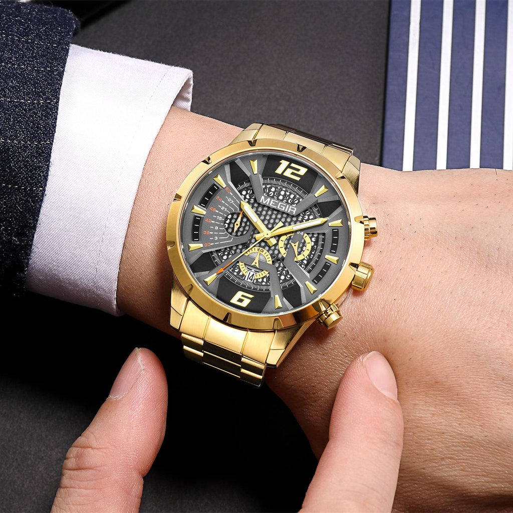 MEGIR 2221 men's chronograph watch on the wrist, gold-tone case with gray-black skeleton dial and gold bracelet