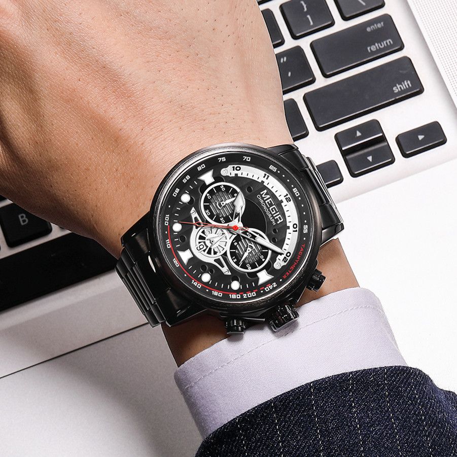 MEGIR 2223 men's chronograph watch on the wrist, black case with black dial and black bracelet