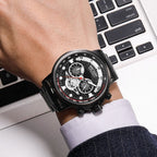 MEGIR 2223 men's chronograph watch on the wrist, black case with black dial and black bracelet