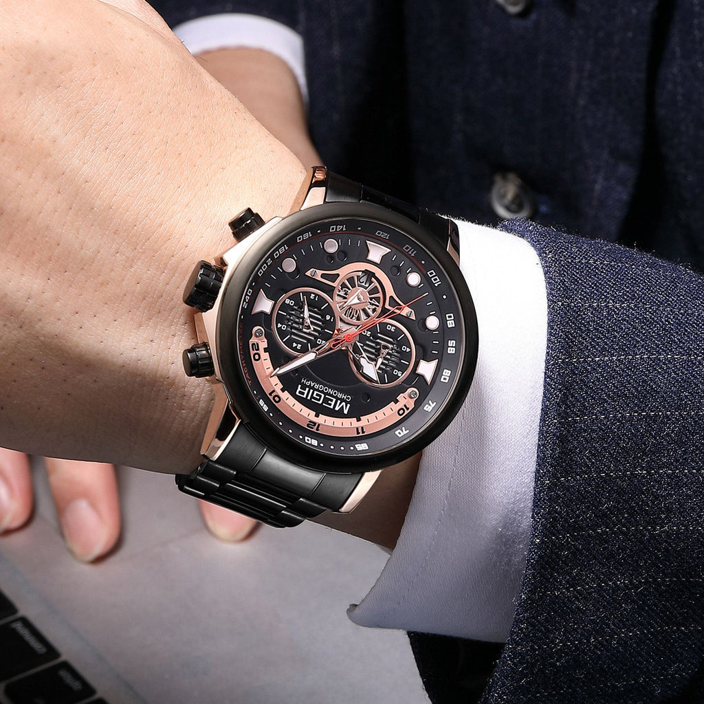MEGIR 2223 men's chronograph watch on the wrist, black case with rose-gold accents, black dial and black bracelet