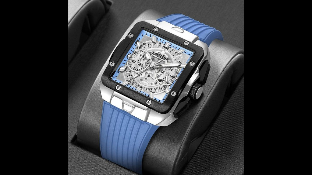 MEGIR 2228 men's chronograph watch, silver square case with blue skeleton dial and blue strap, styled on a stand