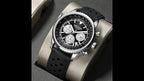 MEGIR 2236 men's chronograph watch, silver case with black dial and black silicone strap, styled on a stand