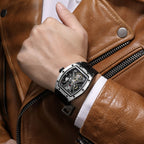 MEGIR 2245 men's skeleton automatic watch on the wrist, silver tonneau case with open dial and black strap