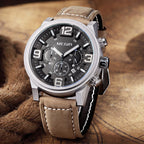 MEGIR 3010 men's chronograph watch, silver case with black dial, sub-dials and brown leather strap, angled view