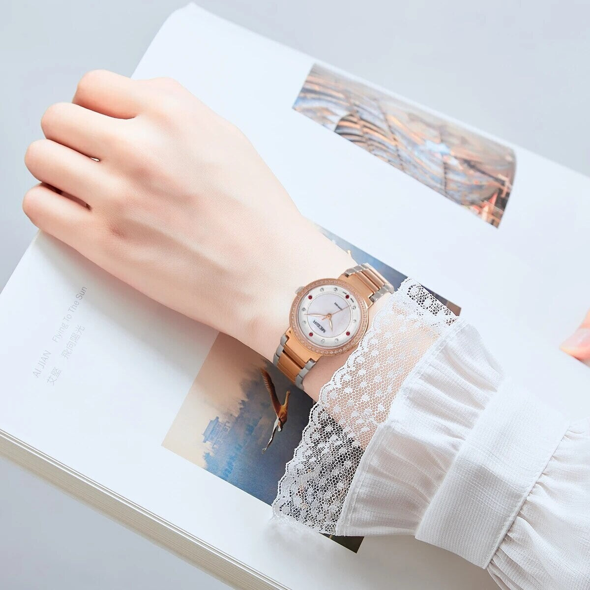 MEGIR 4164 women's quartz watch on the wrist, rose-gold case and bracelet with mother-of-pearl dial