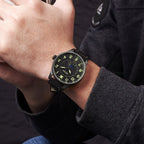 MEGIR 4193 men's moon-phase watch on the wrist, black case with black dial and black leather strap