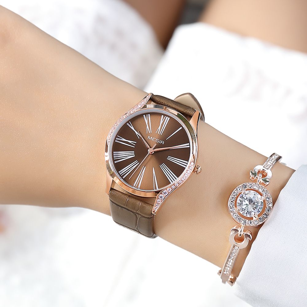 MEGIR 4212 women's quartz watch on the wrist, rose-gold case with brown dial and brown leather strap