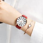 MEGIR 4212 women's quartz watch on the wrist, rose-gold case with white Roman-numeral dial and red strap