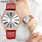 MEGIR 4212 women's quartz watch on the wrist, rose-gold case with white dial and red leather strap