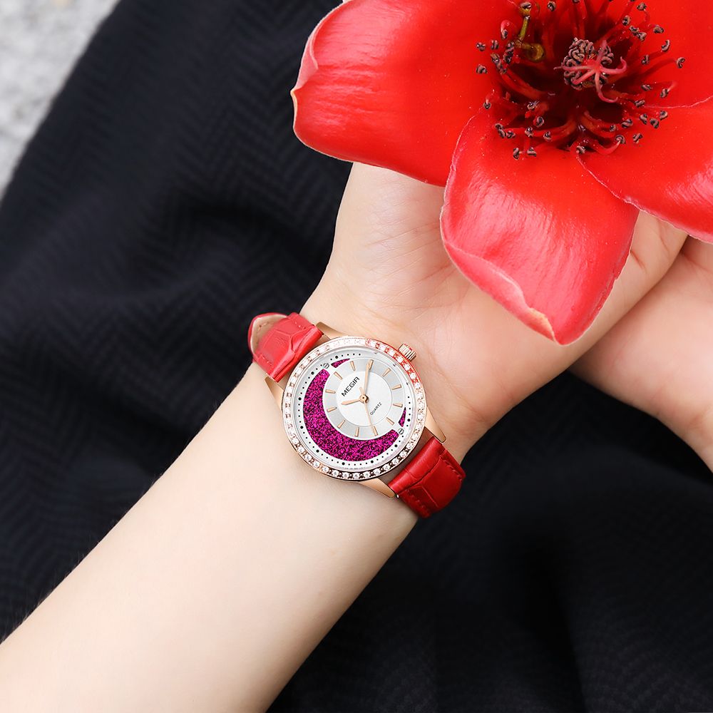 MEGIR 4218 women's quartz watch on the wrist, rose-gold case and red leather strap, with a red flower