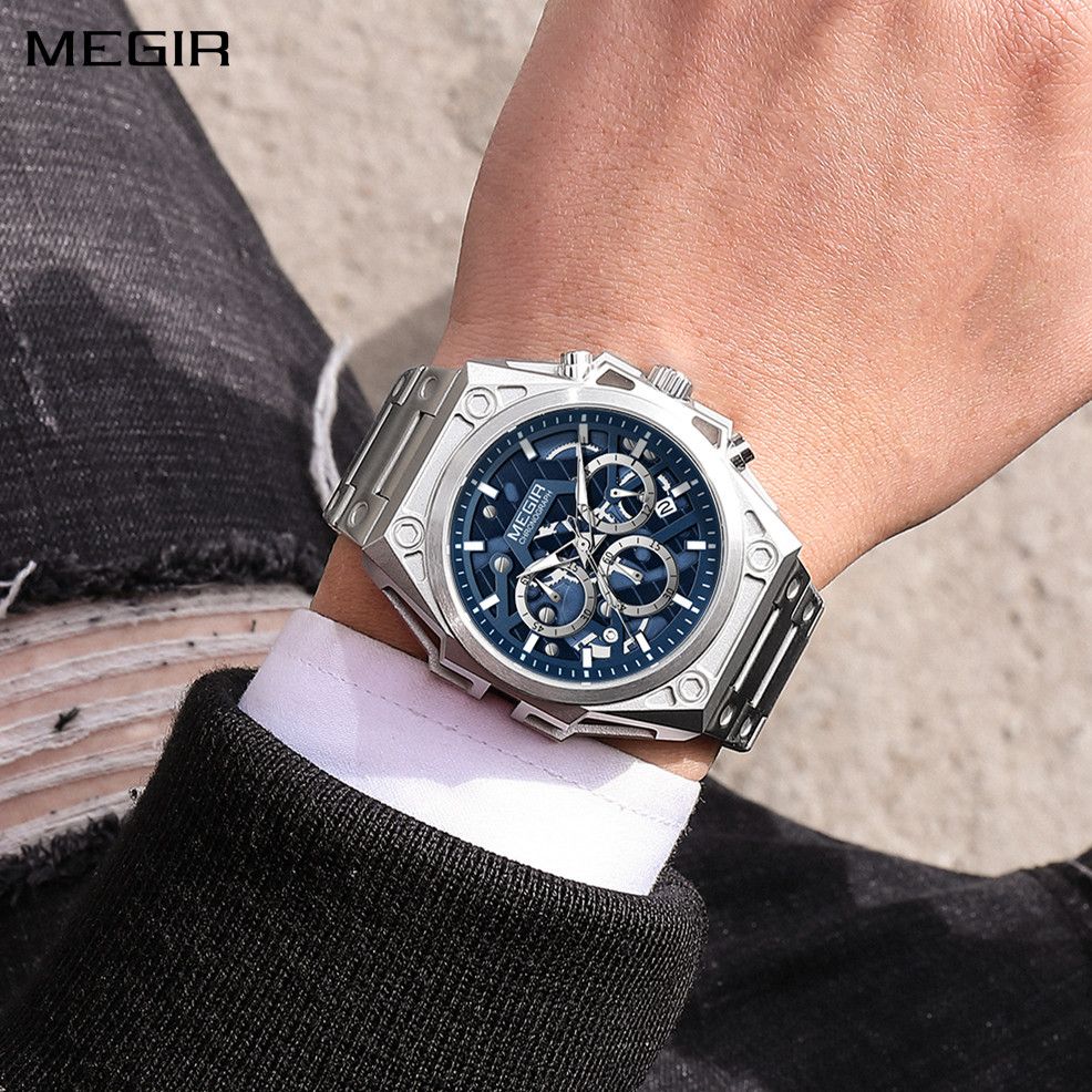 MEGIR 4220 men's chronograph watch on the wrist, silver case with blue skeleton dial and steel bracelet