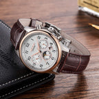 MEGIR 62046 men's moon-phase automatic watch, white dial with moon-phase and date and brown leather strap, angled view