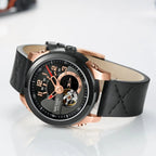 MEGIR 62050 men's automatic watch, rose-gold and black case, black open-heart dial and black leather strap, angled view