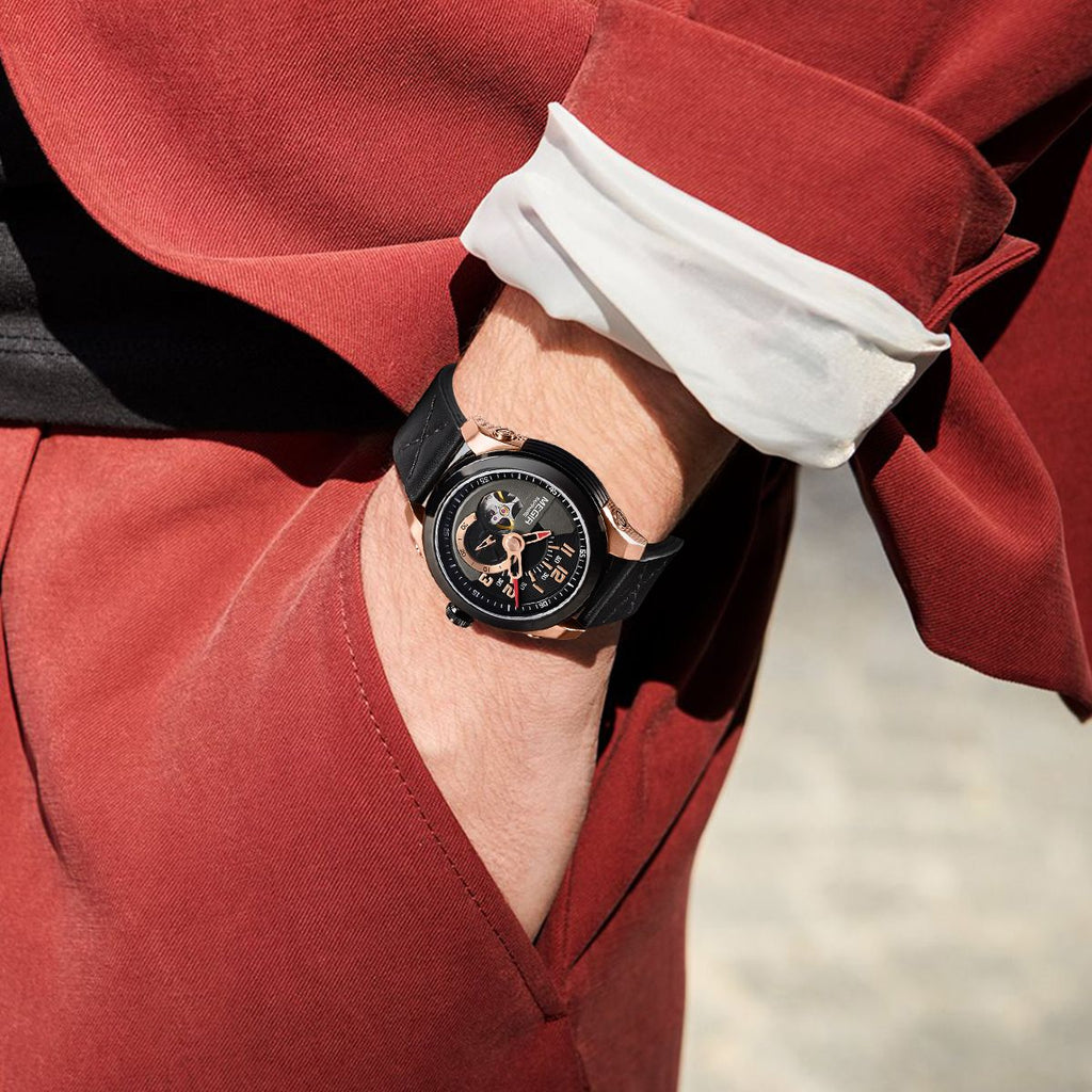 MEGIR 62050 automatic watch on the wrist, rose-gold and black case, black open-heart dial and black strap, red suit
