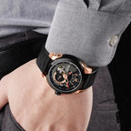 MEGIR 62050 automatic watch on the wrist, rose-gold and black case, black open-heart dial and black leather strap