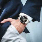 MEGIR 62052 skeleton automatic watch on the wrist, silver case and bracelet with black open-heart dial, with jacket