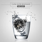 MEGIR 62052 men's skeleton automatic watch water-resistance feature graphic, silver case with black open-heart dial
