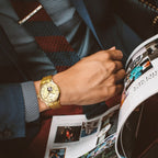 MEGIR 62053 automatic watch on the wrist, gold-tone case and bracelet with gold open-heart dial, with magazine