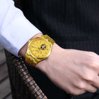 MEGIR 62055 automatic watch on the wrist, gold-tone case and bracelet with gold open-heart dial