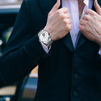 MEGIR 62055 automatic watch on the wrist, silver case and bracelet with white open-heart dial, outdoors