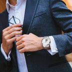 MEGIR 62055 automatic watch on the wrist, silver case and bracelet with white open-heart dial, with suit