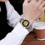 MEGIR 62058 skeleton automatic watch on the wrist, silver case and bracelet with black-ring skeleton dial