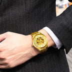 MEGIR 62058 skeleton automatic watch on the wrist, gold-tone case and bracelet with exposed movement dial