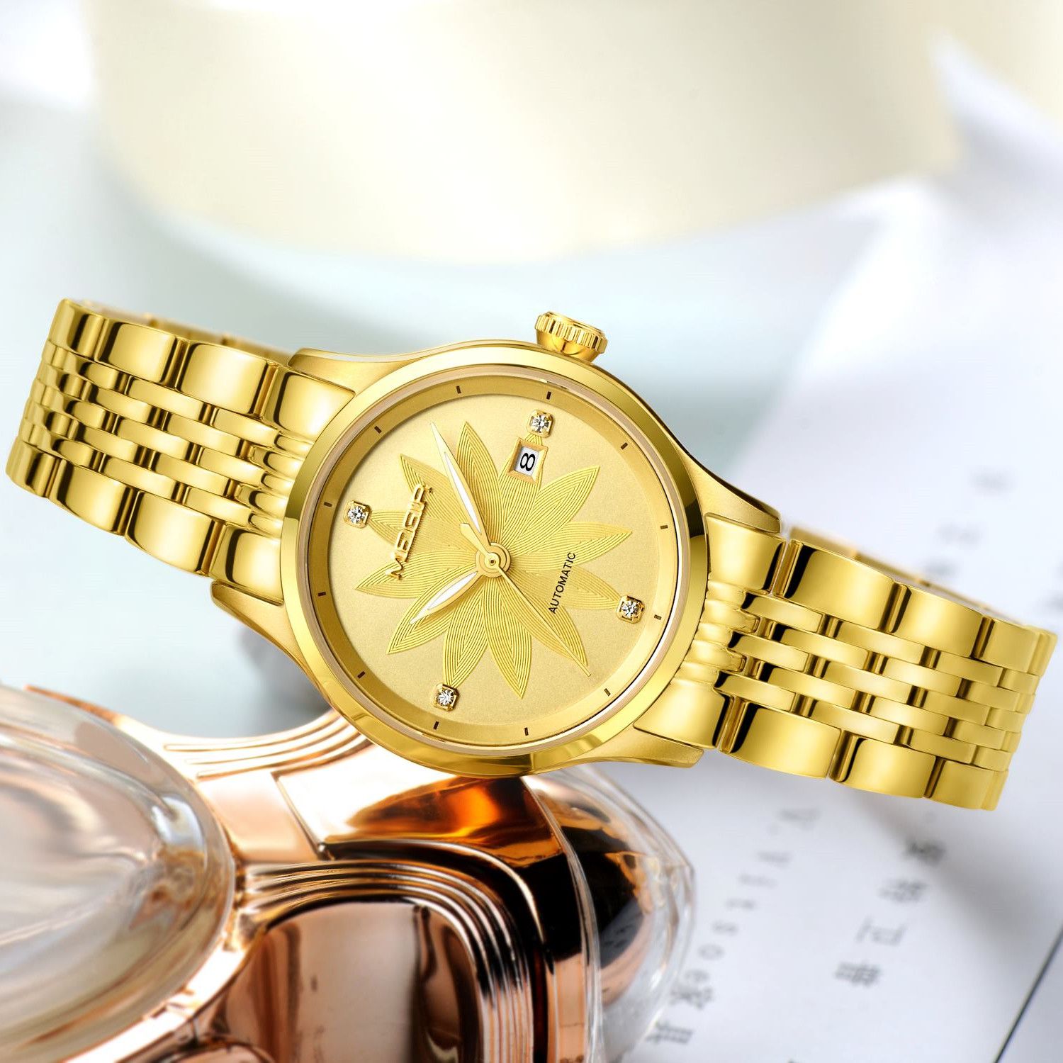 MEGIR 62061 women's automatic watch, gold-tone steel bracelet and gold floral-engraved dial, styled with perfume