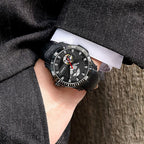 MEGIR 62069 automatic watch on the wrist, black case, black skeleton dial and black leather strap
