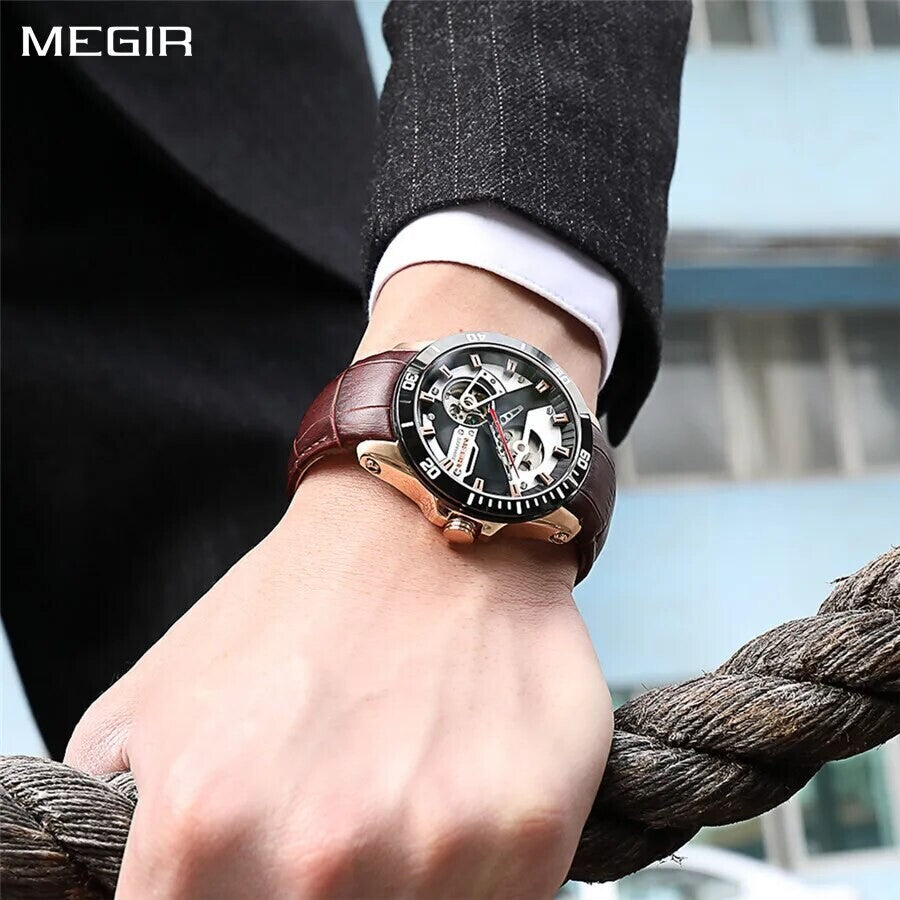 MEGIR 62069 automatic watch on the wrist, rose-gold case, black skeleton dial and brown leather strap