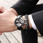 MEGIR 62069 automatic watch on the wrist, silver case, black skeleton dial and black leather strap