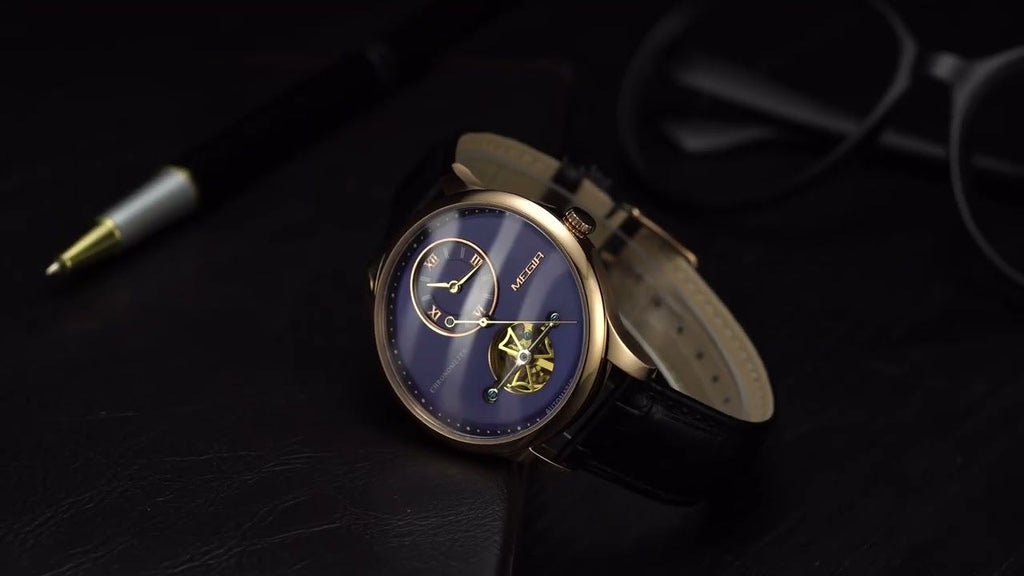 MEGIR 62070 men's automatic watch, rose-gold case, blue open-heart dial and black leather strap, styled with pen