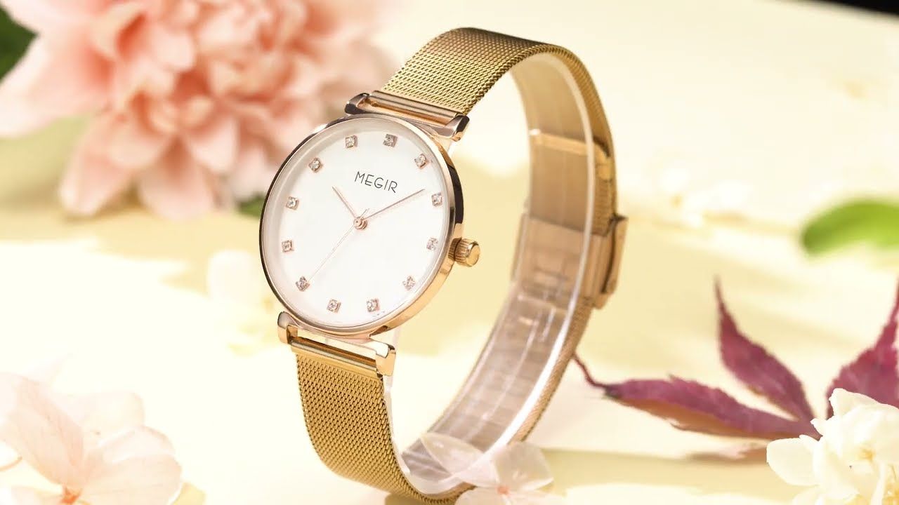 MEGIR 7001 women's quartz watch, rose-gold mesh bracelet and white crystal-marker dial, styled with flowers