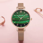 MEGIR 7002 women's quartz watch, rose-gold mesh bracelet and green marbled dial with crystal-set lugs, front view